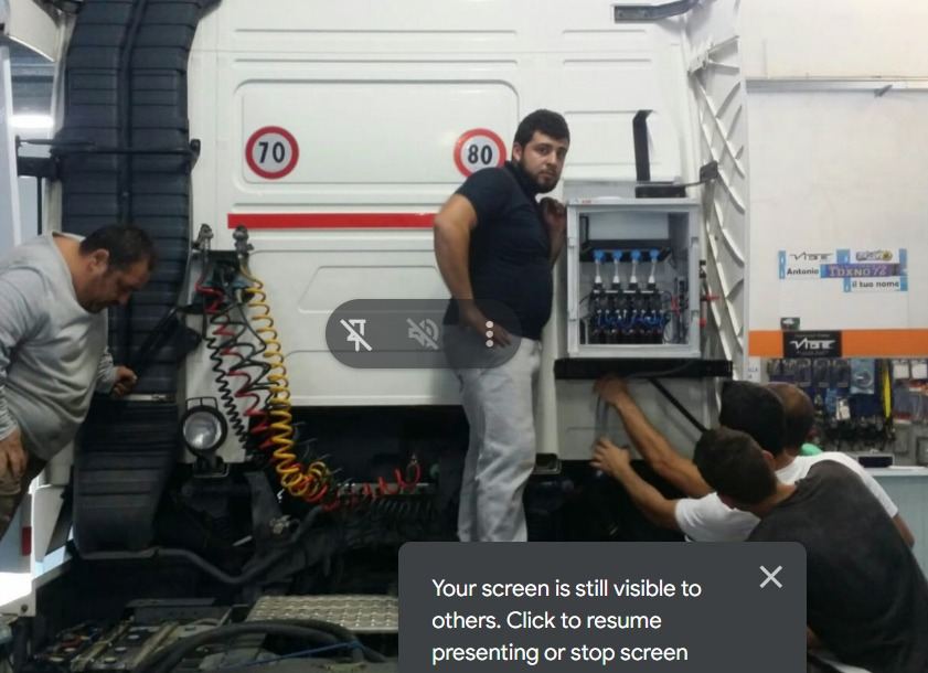 Hydroxi workshop installation team with truck — pack operations photo